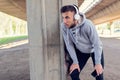 Man runner stretching before training outdoors Royalty Free Stock Photo