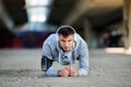 Man runner stretching before training outdoors Royalty Free Stock Photo