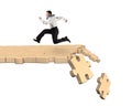 Man running on breaking puzzle path Royalty Free Stock Photo
