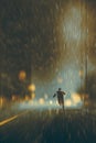 Man running in heavy rainy night Royalty Free Stock Photo