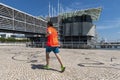 Man running and jogging at the Nations Park in the city of Lisbon