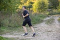 Man running jogging in the park