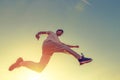 A man running and jump in the air with sunset Royalty Free Stock Photo