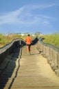 Man running at the morning on woodden path Royalty Free Stock Photo