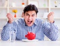 Man running out of money in restaurant and using savings from pi Royalty Free Stock Photo