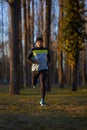 Man running in the park in wintertime