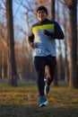 Man running in the park in wintertime