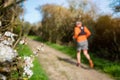 mature man doing a trek in the countryside in spring Royalty Free Stock Photo