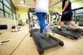 Man running on treadmill in gym Royalty Free Stock Photo