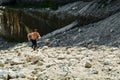 Man Running Up Rocky Hill, Exercising During Outdoor Workout. Sp