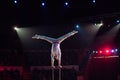 Man`s aerial acrobatics in the Circus ring. Royalty Free Stock Photo