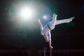 Man`s aerial acrobatics in the Circus ring. Royalty Free Stock Photo