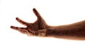 Man`s arm reaching out as if trying to grab at somethings, against white Royalty Free Stock Photo