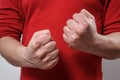 The man`s clenched fists. aggression, domestic or family violence Royalty Free Stock Photo