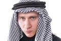 Man's face covered with Arab scarf
