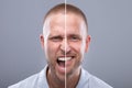 Man's Face Showing Anger And Happy Emotions Royalty Free Stock Photo