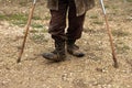 Man with canes in the village