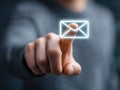 Man\'s finger touching a digital interface with email icon. Generative AI. Royalty Free Stock Photo