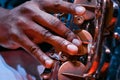 Man`s fingers press keys on his saxophone, playing live jazz, extreme closeup of a virtuoso`s hand