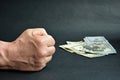 A man's fist hits the table demanding money Royalty Free Stock Photo