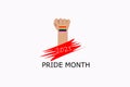 Man`s hand back side handful with small rainbow sticker on wrist the symbol of LGBQ community equality movement