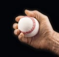 Man's hand with a baseball ball Royalty Free Stock Photo