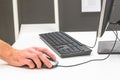 A man`s hand on a computer mouse Royalty Free Stock Photo