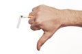Man's hand crushing cigarette