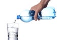 Man`s hand fill a water glass with a plastic bottle, clipping path included Royalty Free Stock Photo