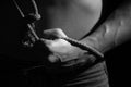 Man's hand grips rope Royalty Free Stock Photo