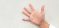 Man`s hand has varicose veins in his right finger and swollen or inflamed