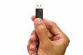 Man`s hand holding usb cable on white background Royalty Free Stock Photo