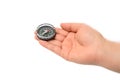 Man`s hand holding a Compass on the white background Royalty Free Stock Photo