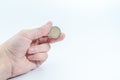 Man`s hand holding euro coin. Finance concept Royalty Free Stock Photo