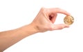 Man`s hand holding golden Bitcoin Royalty Free Stock Photo