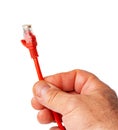Man& x27;s hand holding internet cable on white background Royalty Free Stock Photo