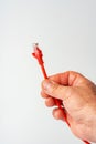 Man& x27;s hand holding internet cable on white background Royalty Free Stock Photo