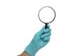 Man`s hand holding magnifying glass, close up isolated on white background, copy space for your text. Magnifier for reading Royalty Free Stock Photo