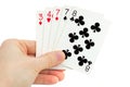 Mans hand holding playing cards (one pair) Royalty Free Stock Photo