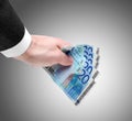 Man's Hand Holding Twenty Euro Notes Royalty Free Stock Photo