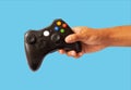 a man's hand holding an xbox controller Royalty Free Stock Photo