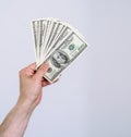 Man hand holds american dollars money. Finance, earnings, crediting