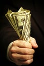 Man's hand holds dollars Royalty Free Stock Photo
