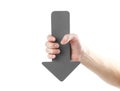 A man`s hand holds a large grey arrow. Close up. Isolated on a w Royalty Free Stock Photo