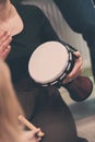 Man`s Hand with Musical Instrument African Djembe Meinl