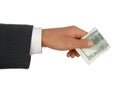 Man's hand offering money. Royalty Free Stock Photo