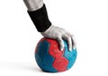 Man`s Hand Pressing Down on Handball Royalty Free Stock Photo