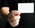 Man's hand showing business card Royalty Free Stock Photo