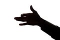 Man`s hand shows symbol dog - silhouette Royalty Free Stock Photo