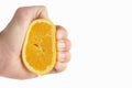 Man's hand squeezing Orange